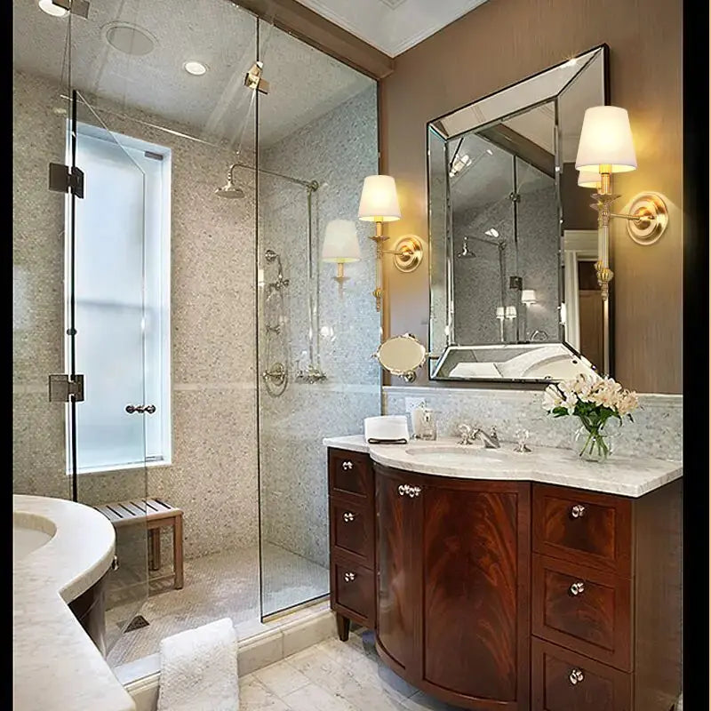 Classic Style Wall Light by Zendrop installed in a modern bathroom, providing stylish illumination alongside luxury fixtures and marble surfaces.