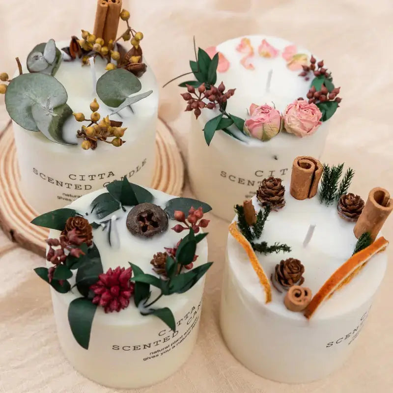 Four Creative Soy Wax Romantic Aromatherapy Candles by Zendrop, featuring natural decorations like dried flowers and herbs.