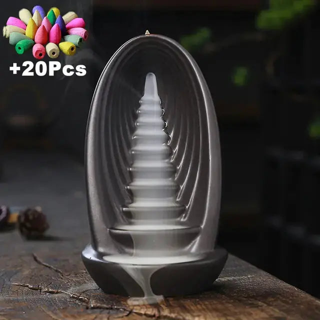 Clay Waterfall Aromatherapy Incense Burner by Zendrop displayed with additional colored incense cones, highlighting its artistic appeal and calming aromatherapy features.