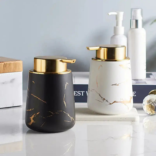 Ceramic Dispensing Bottle by Zendrop featuring a stylish black and gold marbled design, ideal for effortless liquid dispensing and enhancing kitchen aesthetics.