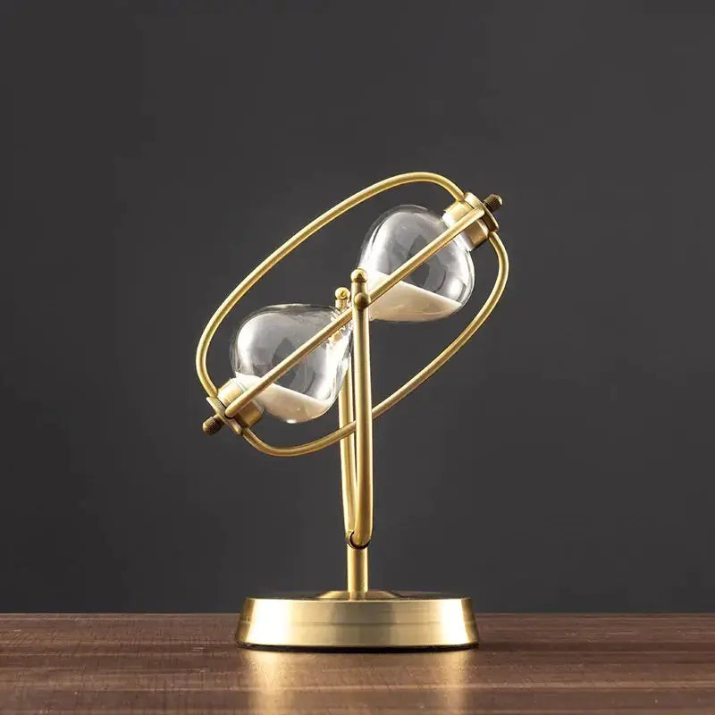 Aurelius Hourglass Timer by Zendrop, featuring a brass frame and rotating design, elegantly showcasing the hourglass with sandflow.
