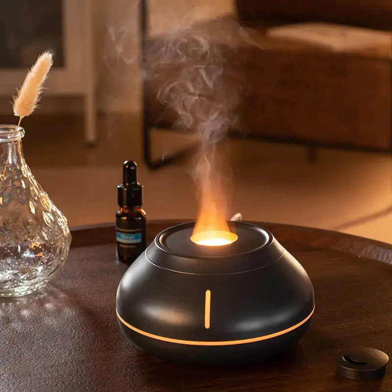 Colorful Humidifier by Zendrop, showcasing a sleek black design with warm LED light and aromatic mist emanating from the top, ideal for enhancing relaxation and ambiance in any space.