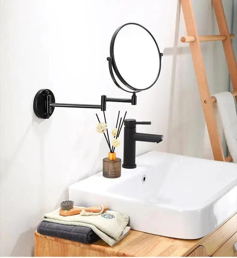 Detailed Maris Magnifying Mirror mounted on a wall near a stylish sink, showcasing its sleek design and functionality. Perfect for enhancing beauty routines, from Zendrop.