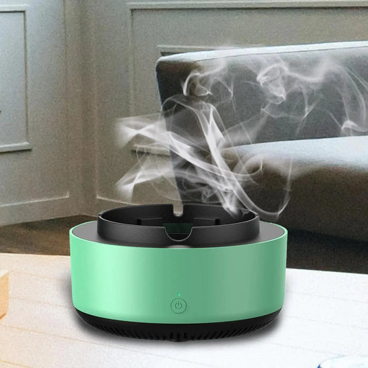 LuxeAura 2-In-1 Ashtray Air Purifier by Zendrop, featuring a smoke-eliminating design with a modern green finish, releasing smoke in a serene indoor environment.