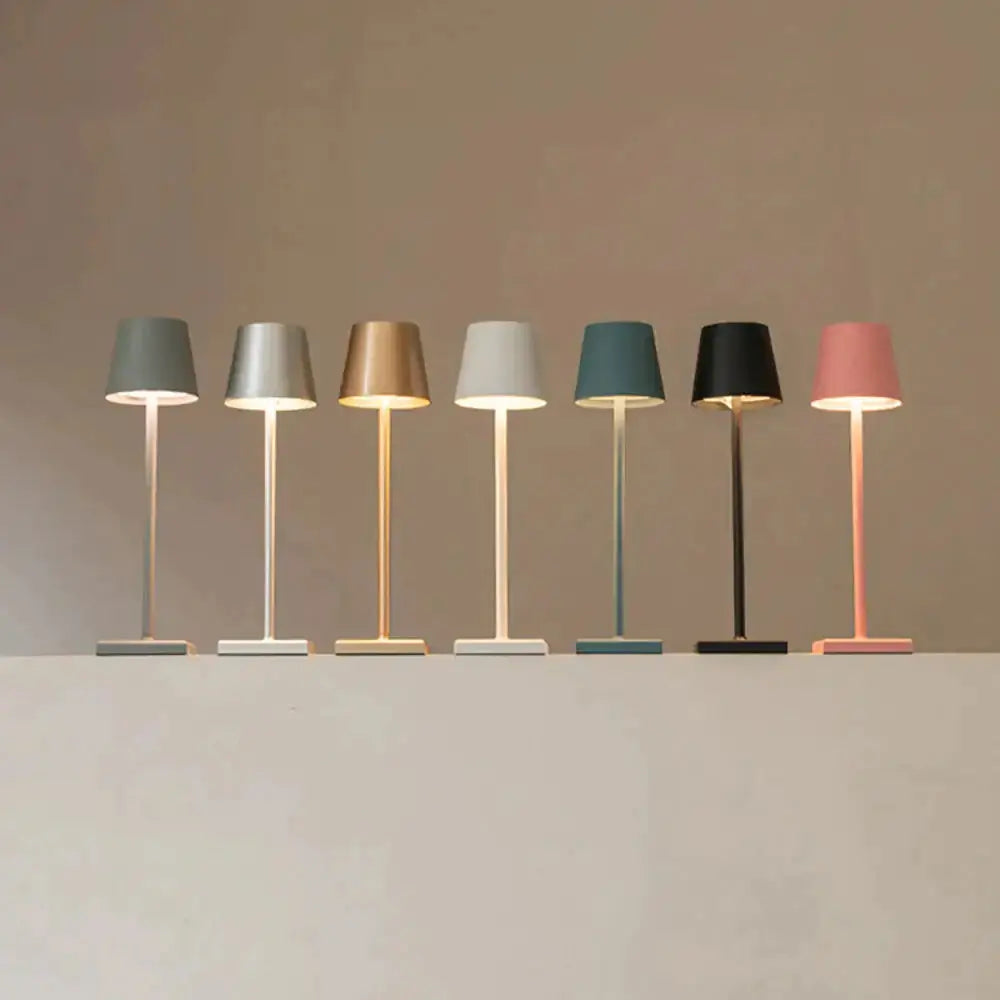 Collection of colorful cordless lamps by Zendrop displayed in a row, showcasing various designs and lighting options for stylish decor.