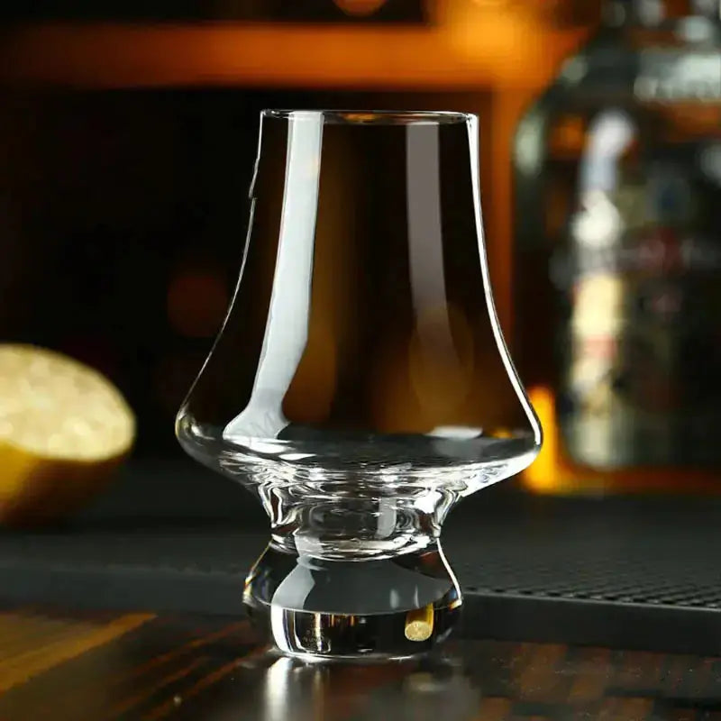 Crystal Tasting Glasses by Zendrop displaying a refined crystal glass filled with dark liquor, perfect for whisky tasting.