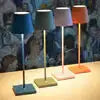 Four elegant cordless lamps in different colors, showcasing modern design suitable for any setting, by Zendrop.