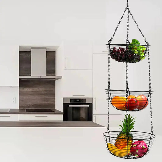 LuxeNest 3-Tier Hanging Fruit Basket by Zendrop displayed in a modern kitchen setting, showcasing colorful fruits including grapes, oranges, and pineapples.