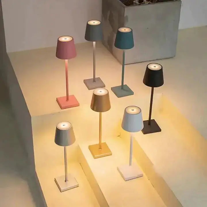 Various stylish cordless lamps displayed in diverse colors and designs, enhancing interior decor, by Zendrop.