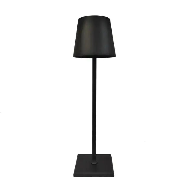 Modern black cordless lamp by Zendrop, suitable for indoor and outdoor settings, showcasing a minimalist design with a sturdy metal base and shade for versatile lighting.